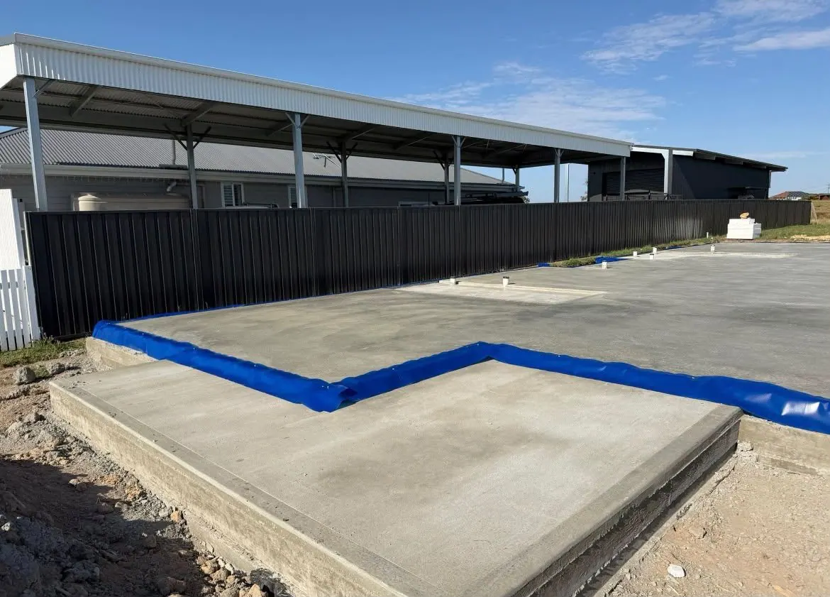 Blue termite barrier system installed around a new concrete slab in Sydney